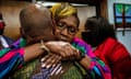 Ahmaud Arbery’s mother, Wanda Cooper-Jones, hugs someone after the jury convicts three men of murder, in Brunswick, Georgia.  