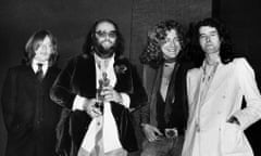 Peter Grant, second, left, with Led Zeppelin and their Ivor Novello award in 1977