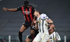 Milan’s Fikayo Tomori rises above the Juventus defender Giorgio Chiellini to score his side’s third goal.