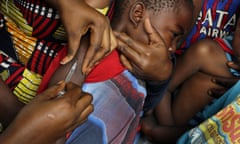 FILE -In this file photo taken Thursday July 21, 2016, residents of the Kisenso district of Kinshasa, receive yellow fever vaccines. Dozens of organizations have started a massive emergency vaccination campaign Wednesday Aug. 17, 2016, in Congo against the largest yellow fever outbreak in decades, trying to stop its global spread. Doctors Without Borders and others are joining Congo’s government and the World Health Organization in targeting about 10.5 million people over the next 10 days.(AP Photo/Jerome Delay)