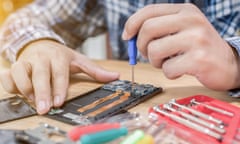 Stock photo of a mobile phone being repaired