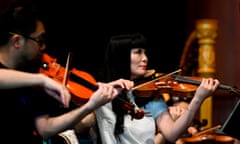 US-CHINA-MUSIC-SHANGHAI-SYMPHONY<br>Members of the Shanghai Symphony Orchestra rehearse before a show at the Wolf Trap Center for Performing Arts in Vienna, Virginia, on August 14, 2019. - The Shanghai Symphony Orchestra has two shows in the US on their worldwide tour, Washington, DC and Chicago, Illinois. (Photo by Andrew CABALLERO-REYNOLDS / AFP)ANDREW CABALLERO-REYNOLDS/AFP/Getty Images