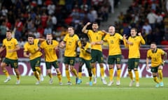 Australia players celebrate their penalty shootout victory over Peru in the World Cup playoff to seal their spot in Qatar.