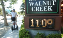 Mike Dupray rides his Segway scooter through town during a record-breaking heat wave in Walnut Creek, Calif., Saturday, July 22, 2006. Triple digit temperatures across California strained thermometers and air conditioners and prompted dozens of scattered electricity outages that left residents sizzling. (AP Photo/Contra Costa Times, Karl Mondon) ** MAGS OUT NO SALES ARCHIVE OUT MANDATORY CREDIT **