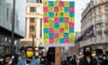 Demonstrators holds flags and placards during a rally of HongKongers against the Chinese Communist party in Chinatown, London, in 2021.