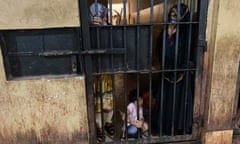 Ayesha Bashir, right, in a Karachi cell with her five-year-old daughter before a deportation hearing this week. Bashir says she has been held in detention for three months.