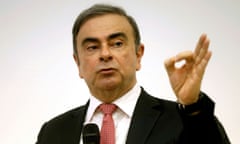 Carlos Ghosn gestures during a news conference in Beirut in January