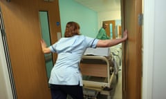 Nurse holding open doors