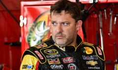 In this Friday, Aug. 8, 2014 photograph, Tony Stewart stands in the garage area after a practice session for Sunday's NASCAR Sprint Cup Series auto race at Watkins Glen International, in Watkins Glen N.Y. Stewart struck and killed Kevin Ward Jr., 20, a sprint car driver who had climbed from his car and was on the track trying to confront Stewart during a race at Canandaigua Motorsports Park in upstate New York on Saturday night. Ontario County Sheriff Philip Povero said his department's investigation is not criminal and that Stewart was "fully cooperative" and appeared "very upset" over what had happened. (AP Photo/Derik Hamilton)