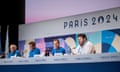 James Fitzgerald, Head of Media Relations, and Witold Banka, President of Wada, World Anti-Doping Agency, Olivier Niggli, Director General, and Darren Mullaly, independent observer, attend at a press conference during day one of the Paris 2024 Olympic Games.
