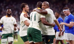 South Africa’s Makazole Mapimpi celebrates with teammates after scoring their seventh try.