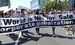 Bris-Can protestors march through the streets of Brisbane on the first day of the G20 leaders summit on 15 November 2014 as officials from the 20 biggest industrialised and developing economies met.