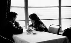 ‘The waiter did not come, the clock / forgot them’ ... a young couple sit by the window of a cafe.