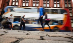 Bus drives down Oxford Road in Manchester