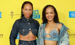 two women in glamorous denim outfits