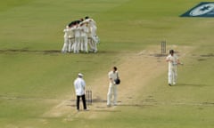 Australian players celebrate after dismissing Chris Woakes of England to regain the Ashes on the final day of the third Test in Perth.