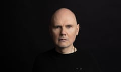 Billy Corgan, against a black background.