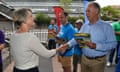 Liberal's John Alexander and Labor's Kristina Keneally shake hands as they campaign in Sydney.