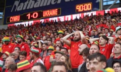 The tension shows on Wales fans in added time of their 1-0 playoff win against Ukraine