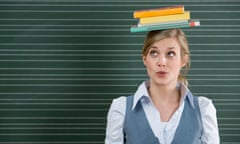 Teacher with books on her head