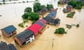 This aerial photo taken on July 28, 2024 shows a flood-affected village following heavy rains caused by Typhoon Gaemi in Zixing, in central China's Hunan province