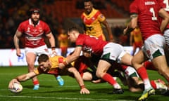 Dan Russell scores the fourth try for Papua New Guinea in their win against Wales