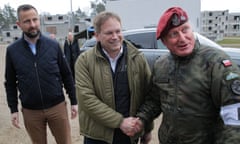 Polish deputy prime minister and minister of national defense Wladyslaw Kosiniak-Kamysz (l), Grant Shapps (c) and 1st deputy commander general of the armed forces Marek Sokolowski at the Orzysz training ground in north-east Poland