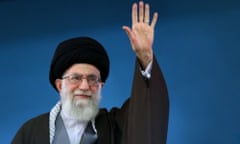 A handout picture released by the official website of the Centre for Preserving and Publishing the Works of Iran’s supreme leader Ayatollah Ali Khamenei, shows him saluting the people during a recent meeting in Tehran.