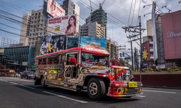 A jeepney cruises through Metro Manila