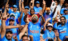 India fans show their support during the semi-final against New Zealand