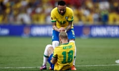 Neymar Jr. of Brazil helps teammate Antony stand up during a match between Brazil and Chile as part of FIFA World Cup Qatar 2022 Qualifier on March 24, 2022 in Rio de Janeiro, Brazil. (Photo by Buda Mendes/Getty Images)