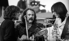 Crosby, Stills, Nash and Young performing on stage