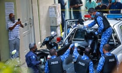 Maldives police officers impound a scooter belonging to a suspected terrorist in connection with the blast in Male