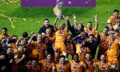 Montpellier’s Benoît Paillaugue lifts the trophy at Twickenham.