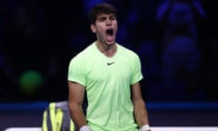 Carlos Alcaraz celebrates winning his ATP group stage match against Russia's Daniil Medvedev.