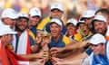 Luke Donald and his team celebrate with the Ryder Cup trophy