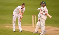 Will Young and Joe Clarke of Nottinghamshire (right) have a chat with Craig Overton of Somerset.