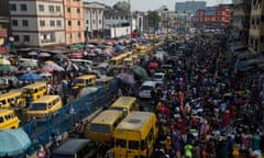 NIGERIA-CHRISTMAS<br>Roadside vendors take over Idumota road to sell their wares ahead of Chritsmas festival in Lagos, on December 16, 2019. - As Christmas festival and holidays draws near, Lagos metroplis, Nigeria’s commercial capital is a behive of activites and almost at its peak as people shop for gift items for relatives, friends and loved ones, despite the prevailing traffic gridlock, erractic power supply, and the most intense heat wave ever in its history associated with climate change. (Photo by PIUS UTOMI EKPEI / AFP) (Photo by PIUS UTOMI EKPEI/AFP via Getty Images)