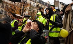 Gilets jaunes activists in Paris on the fifth anniversary of the movement, which originated in protests against a carbon tax on fuel, on 18 November 2023.