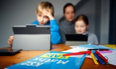 MPs Pressure PM To Announce Plan To Reopen Schools<br>CUCKFIELD, ENGLAND - JANUARY 27: 10 year old Oscar Mumby and 8 year old Harriet Mumby (son and daughter of the photographer) are assisted with their online schoolwork by their mother Jo Mumby as homeschooling continues due to school closures on January 27, 2021 in Cuckfield, United Kingdom. Under current government policy, schools in England wouldn't open before the February half-term break at the earliest, but the prime minister has declined to commit to reopening them before Easter. (Photo by Max Mumby/Indigo/Getty Images)