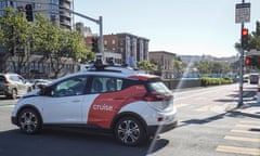 A driverless Cruise taxi is seen on the road of San Francisco. 