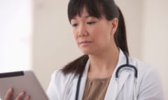 doctor using digital tablet