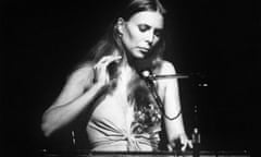 Joni Mitchell performing at the New Victoria Theatre, London, April 1974.