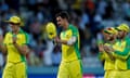 Mitchell Starc is congratulated by Australia teammates on his 5-26 that demolished New Zealand