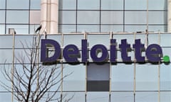 The Deloitte logo is seen on a commercial tower at Gurgaon, on the outskirts of New Delhi