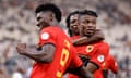 Gelson Dala (right) celebrates with teammates after scoring Angola's second goal in their Africa Cup of Nations match against Mauritania.