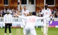 England's James Anderson celebrates after taking the wicket of West Indies' Alick Athanaze caught by Jamie Smith.