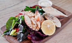 A fish platter, served on a wooden board, from the
The Old Boat House, Amble, Northumberland, UK.