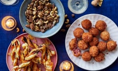 Ravinder Bhogal’s Christmas party snacks: lime leaf and togarashi spiced nuts, mango chutney cheese straws with poppy seeds, and beetroot and goat's cheese croquetas.