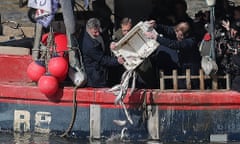 Nigel Farage throwing fish into the River Thames